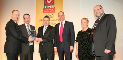 F.J. Charleton with the Master Builder Award